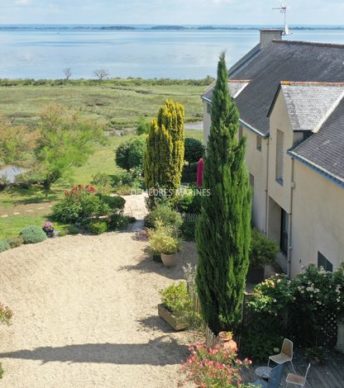 Propriété de prestige les pieds dans l’eau